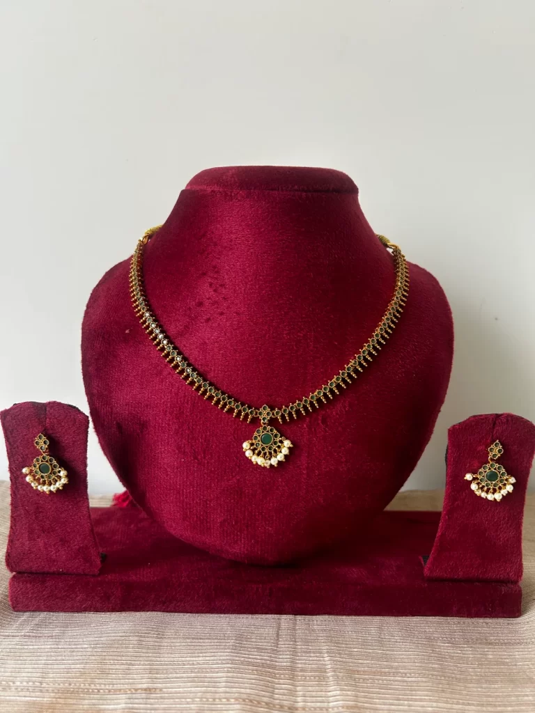 Antique gold premium attigai necklace set with green stones - S-cube Fashions