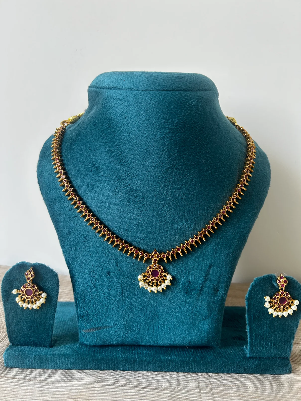 Antique gold premium attigai necklace set with red stones - S-cube Fashions