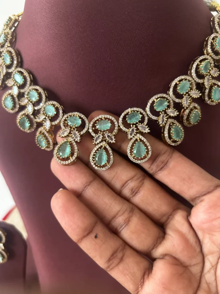 Dewdrop statement necklace set with mint green stones