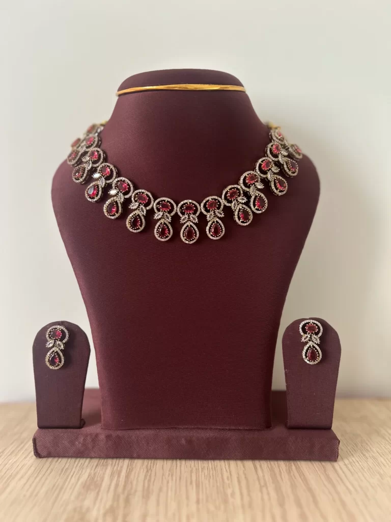 Dewdrop statement necklace set with emerald pink stones