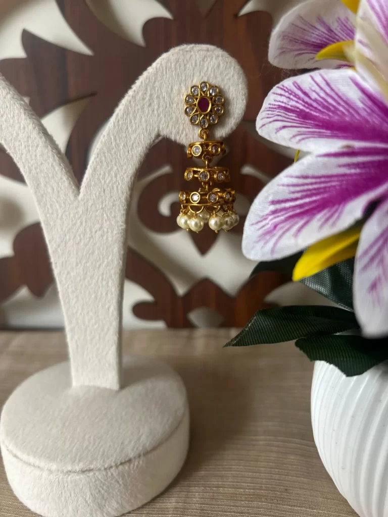 Elegant Layered Pearl Drop Jhumka Earrings – Matte Gold Finish