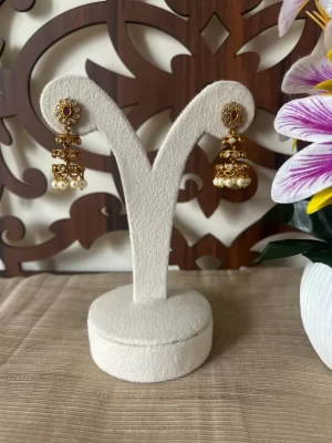 Matte gold layered jhumka earrings with floral studs and pearl drops – S-cube Fashions