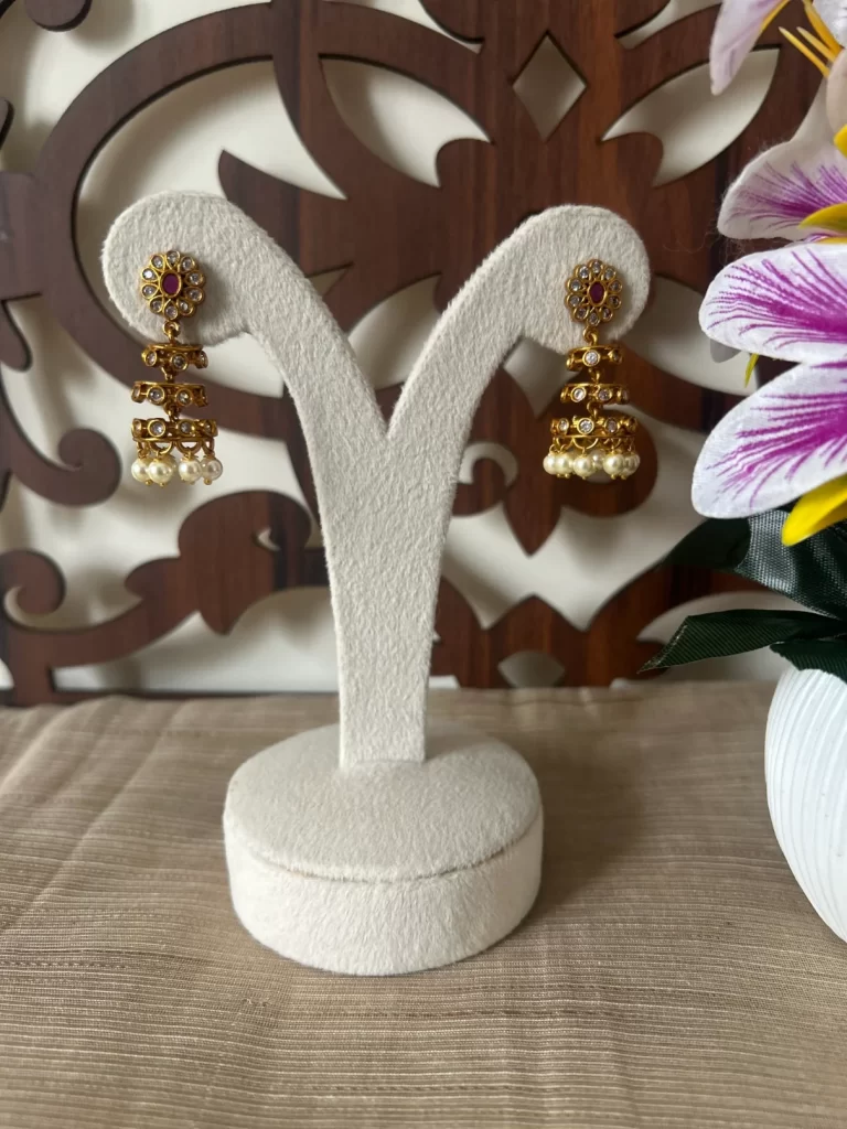 Elegant Layered Pearl Drop Jhumka Earrings – Matte Gold Finish