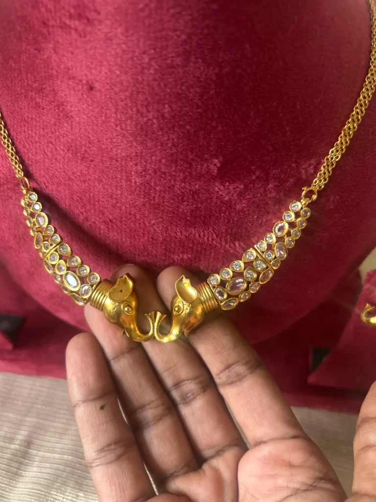 Antique gold elephant kanti necklace set with matching stud earrings - S-cube Fashions