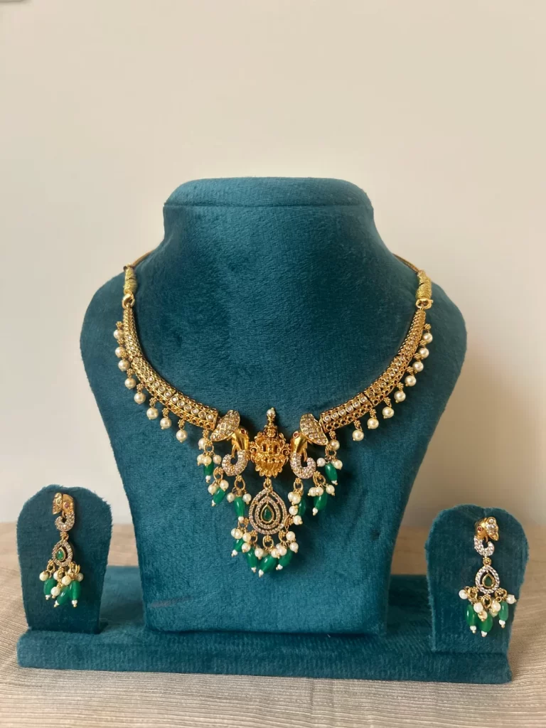 Antique gold elephant kanti necklace set with green bead drops - S-cube Fashions