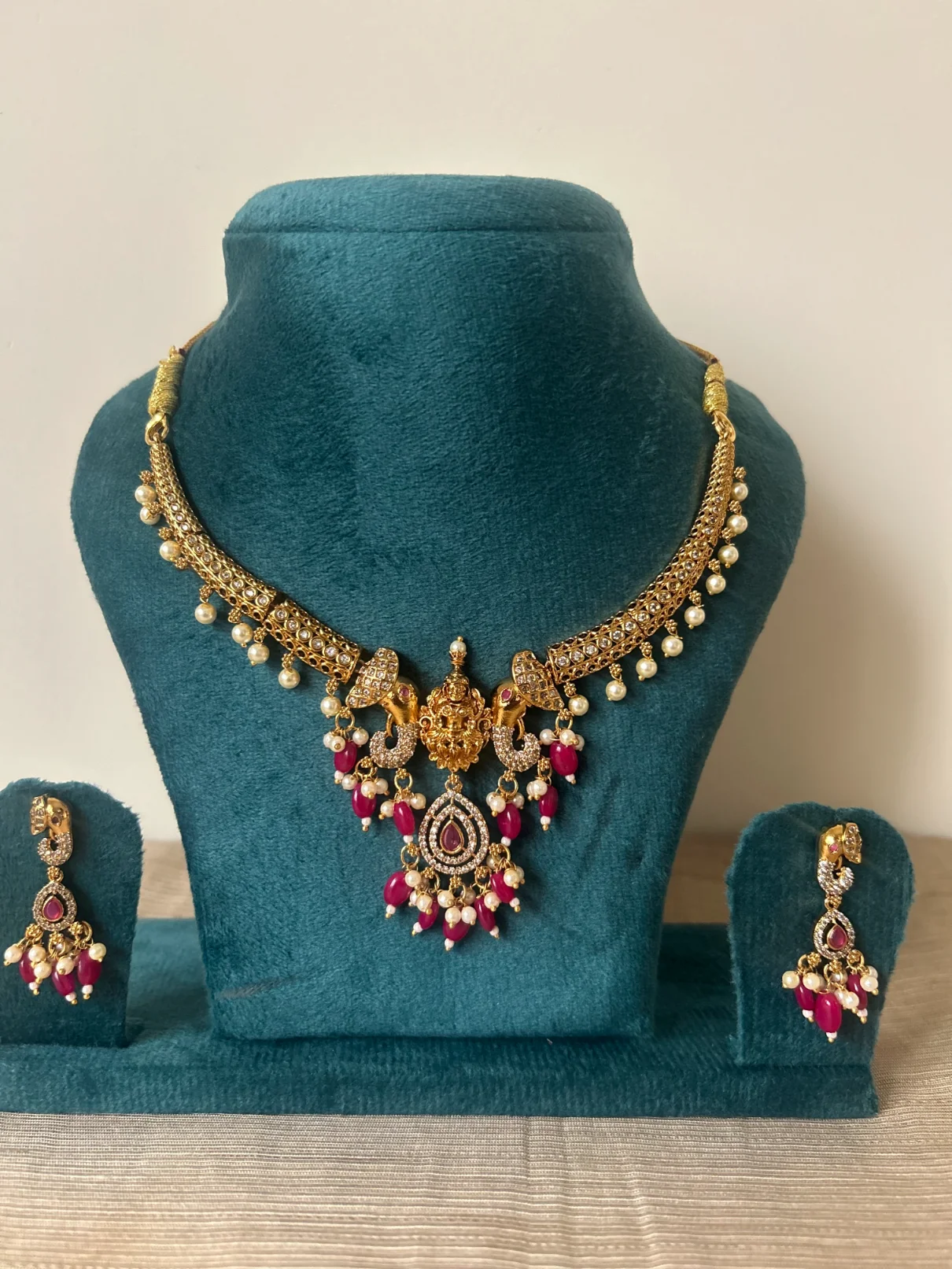 Gold elephant kanti necklace set with pink bead drops - S-cube Fashions
