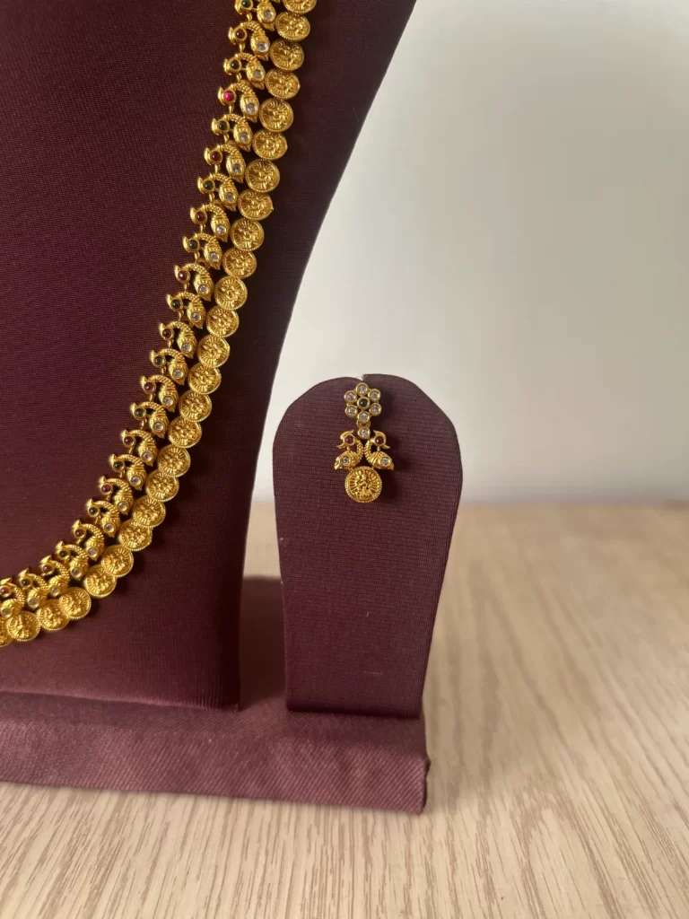 Gold look-alike Lakshmi coin mid length haram set with matching earrings - S-cube Fashions & Jewellery