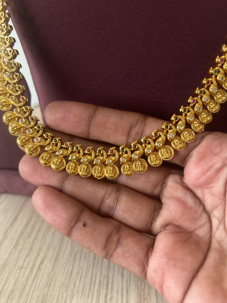 Gold look-alike Lakshmi coin mid length haram set with matching earrings - S-cube Fashions & Jewellery