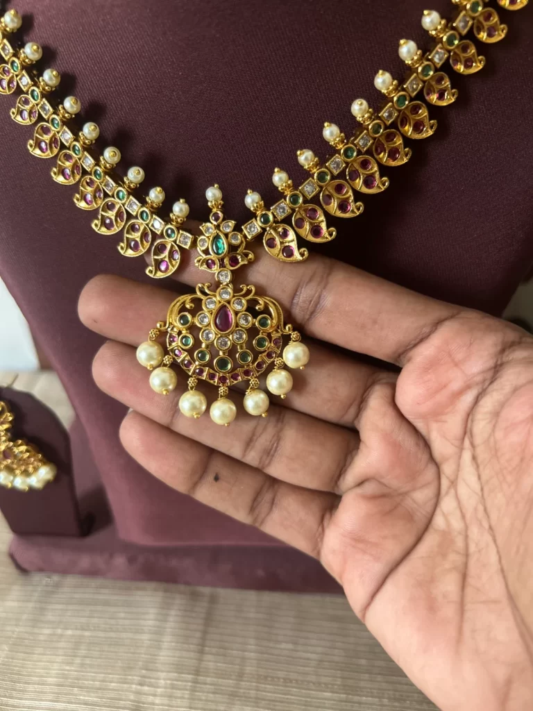 Gold look-alike pearl drop necklace set with ruby emerald stones and matching earrings - S-cube Fashions