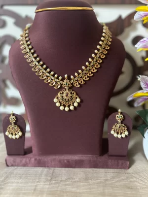 Gold look-alike pearl drop necklace set with ruby emerald stones and matching earrings - S-cube Fashions