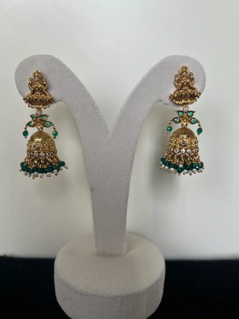 Antique gold Lakshmi devi jhumka earrings with green bead drops - S-cube Fashions
