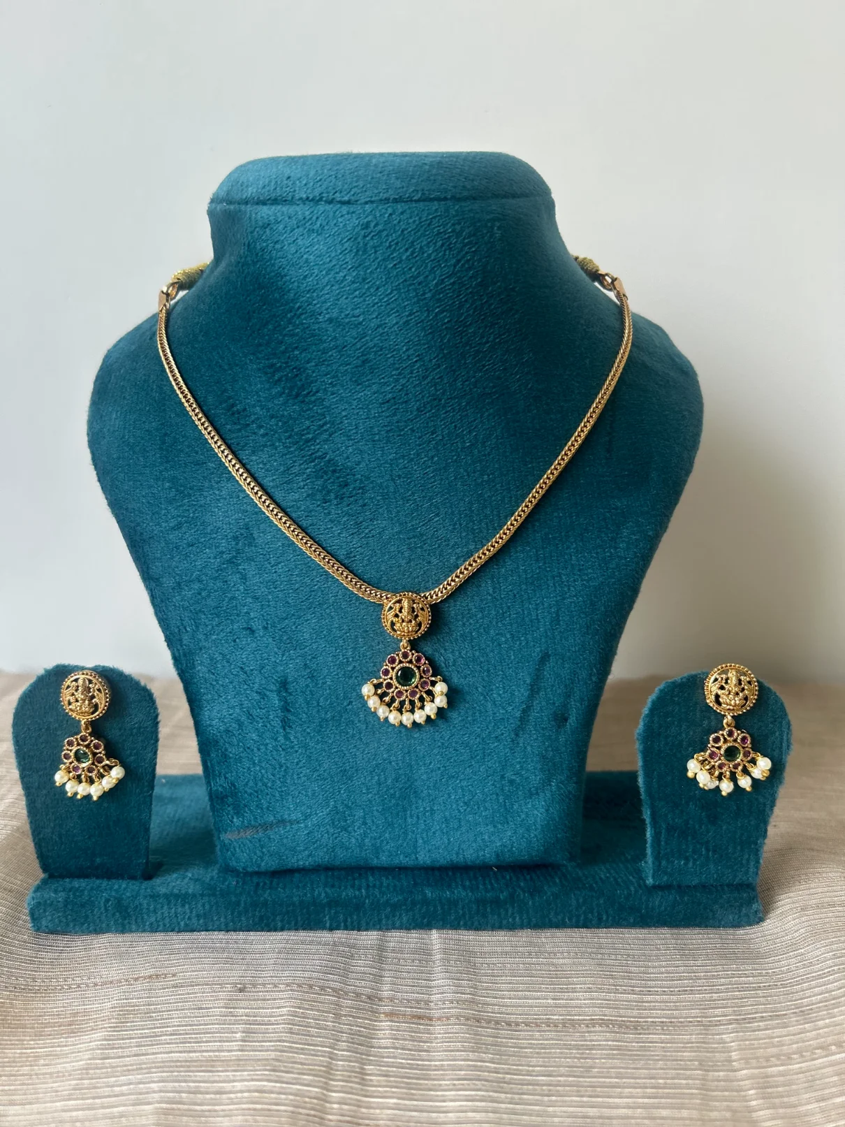 Antique gold Lakshmi kemp stone attigai necklace set with pearl drop - S-cube Fashions
