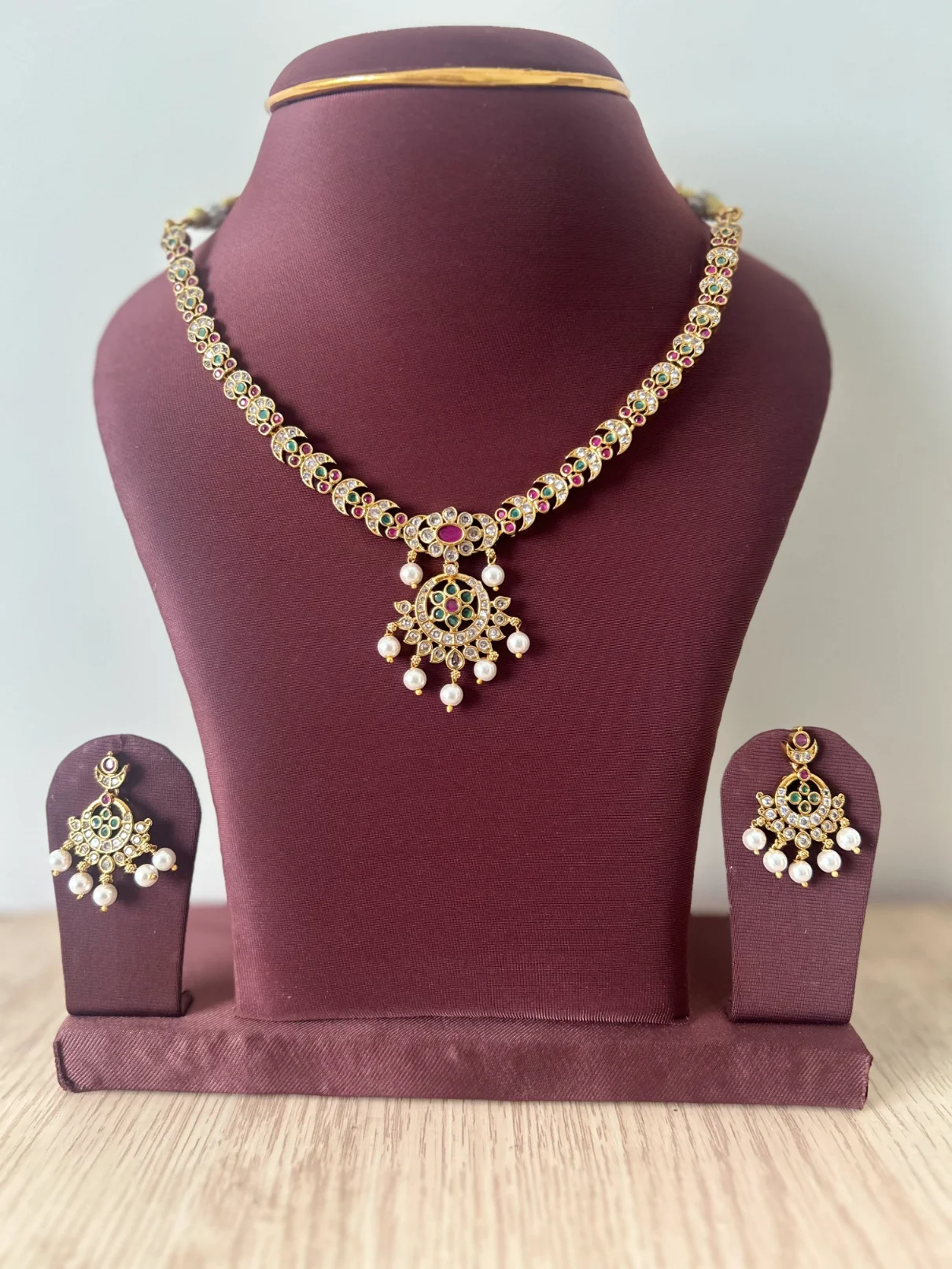 Non-idol gold look-alike pearl drop necklace set with sunburst pendant - S-cube Fashions