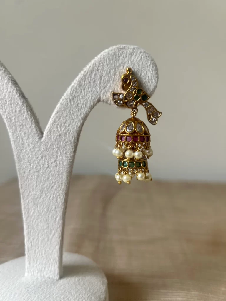 Antique gold peacock two-tier kemp stone jhumka earrings with pearl fringe - S-cube Fashions