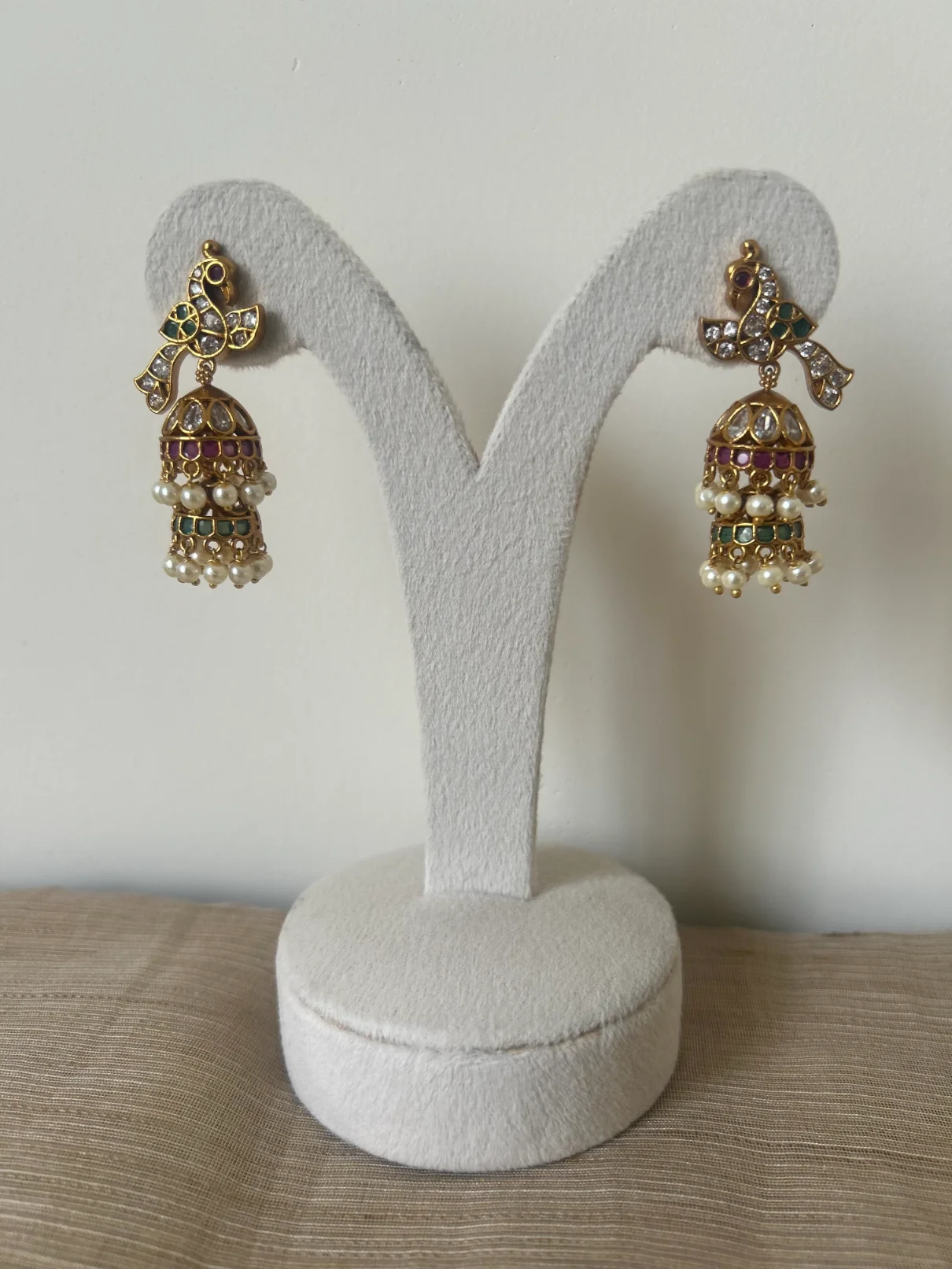 Antique gold peacock two-tier kemp stone jhumka earrings with pearl fringe - S-cube Fashions