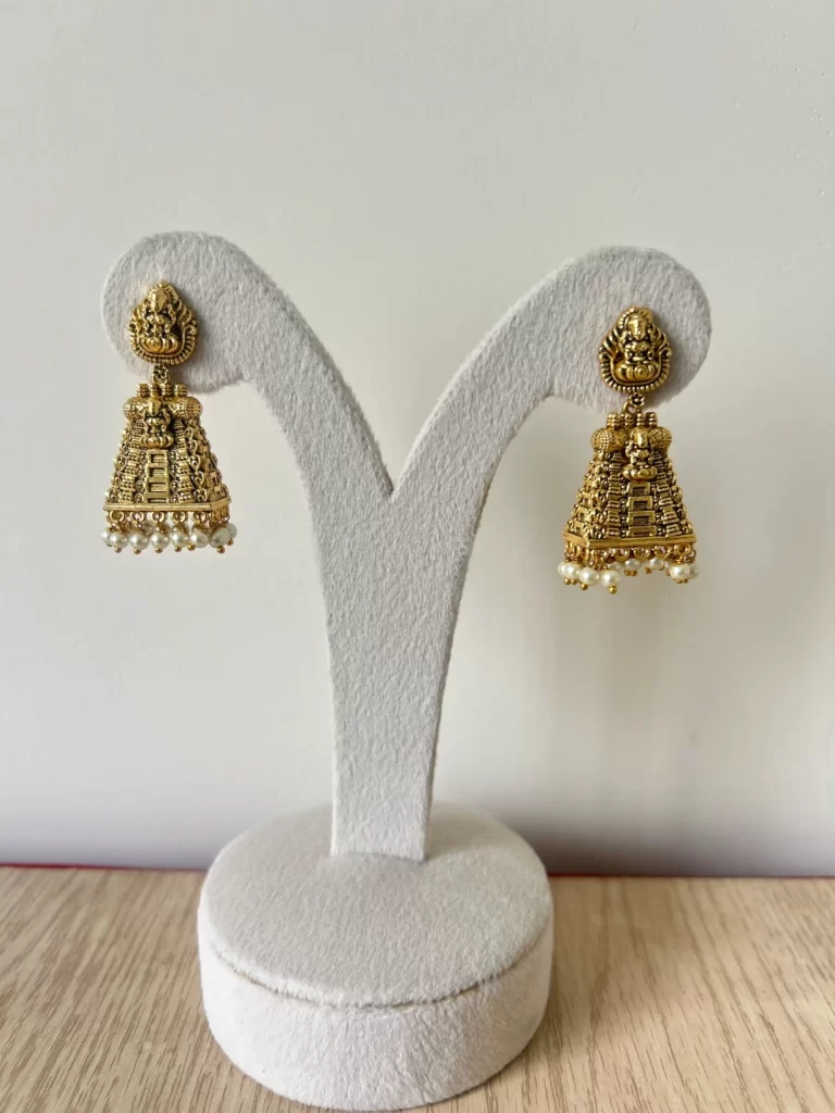 Antique finish gopuram jhumka earrings with Lakshmi motif and pearl drops - S-cube Fashions
