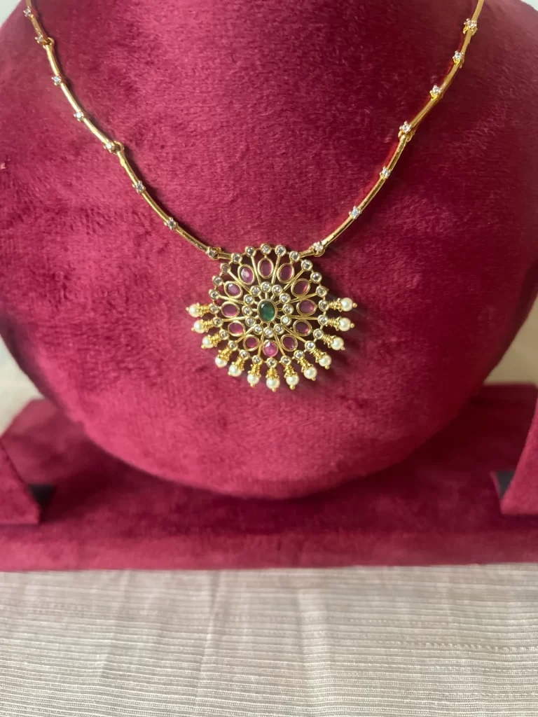 Gold-toned moon kanti necklace set with sunburst pendant and pearl fringe - S-cube Fashions