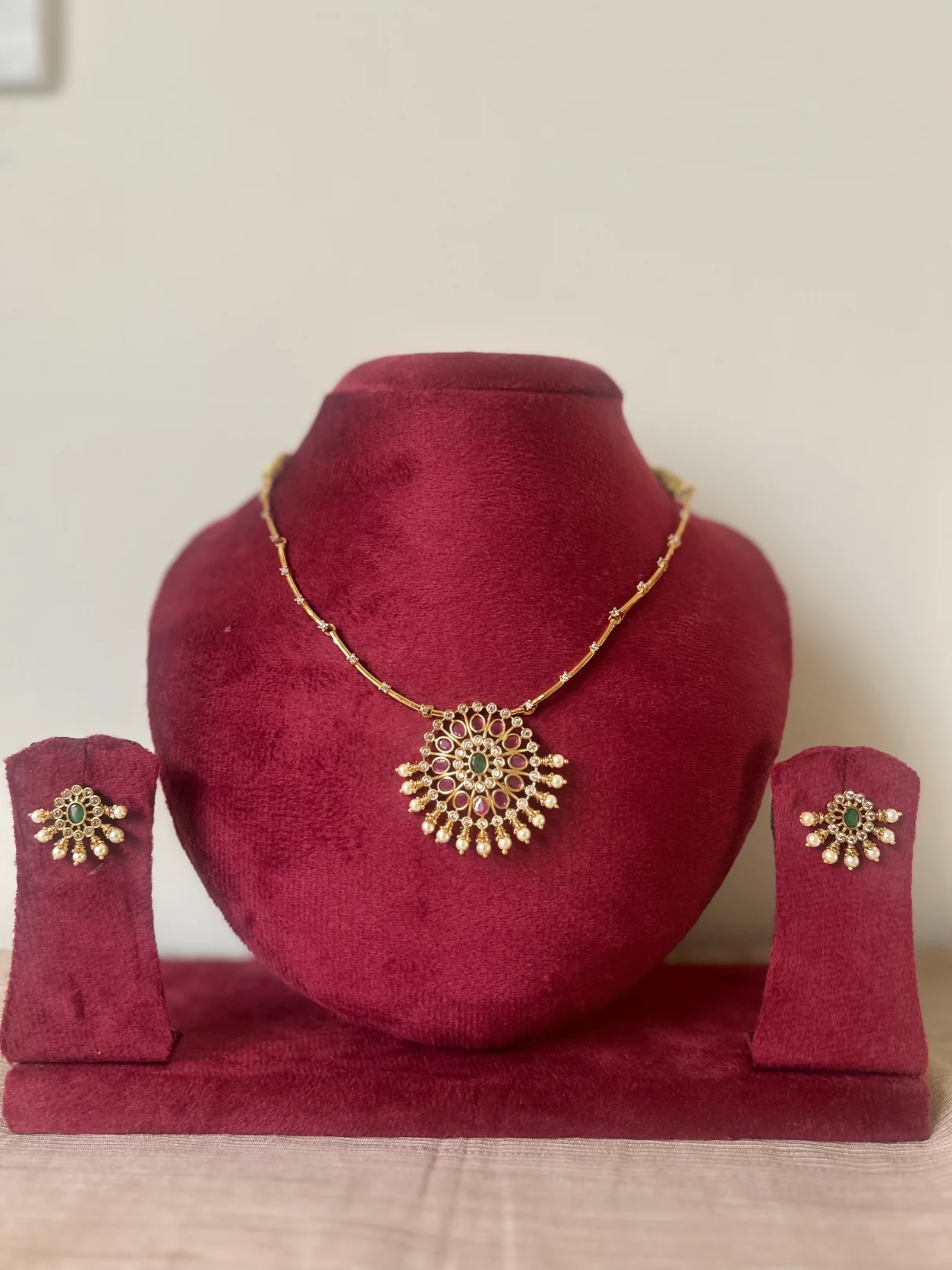 Gold-toned moon kanti necklace set with sunburst pendant and pearl fringe - S-cube Fashions