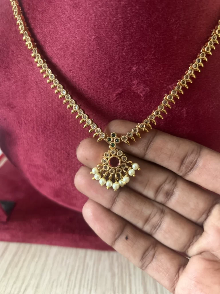 Premium gold plated attigai necklace set with pearl drop pendant