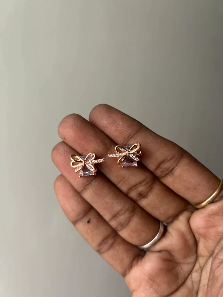 Rosegold bow stud earrings with clear white crystal stone