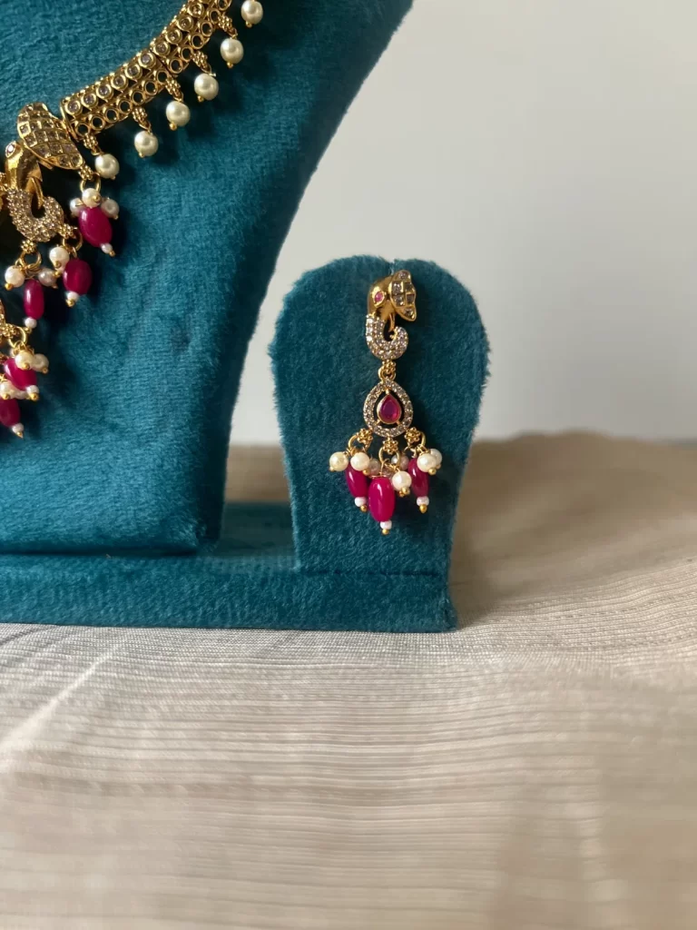 Antique gold elephant kanti necklace set with pink bead drops - S-cube Fashions