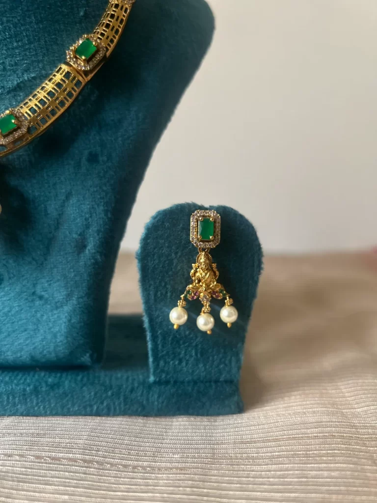 Antique gold Lakshmi devi kanti necklace set with emerald stones and pearl drops - S-cube Fashions
