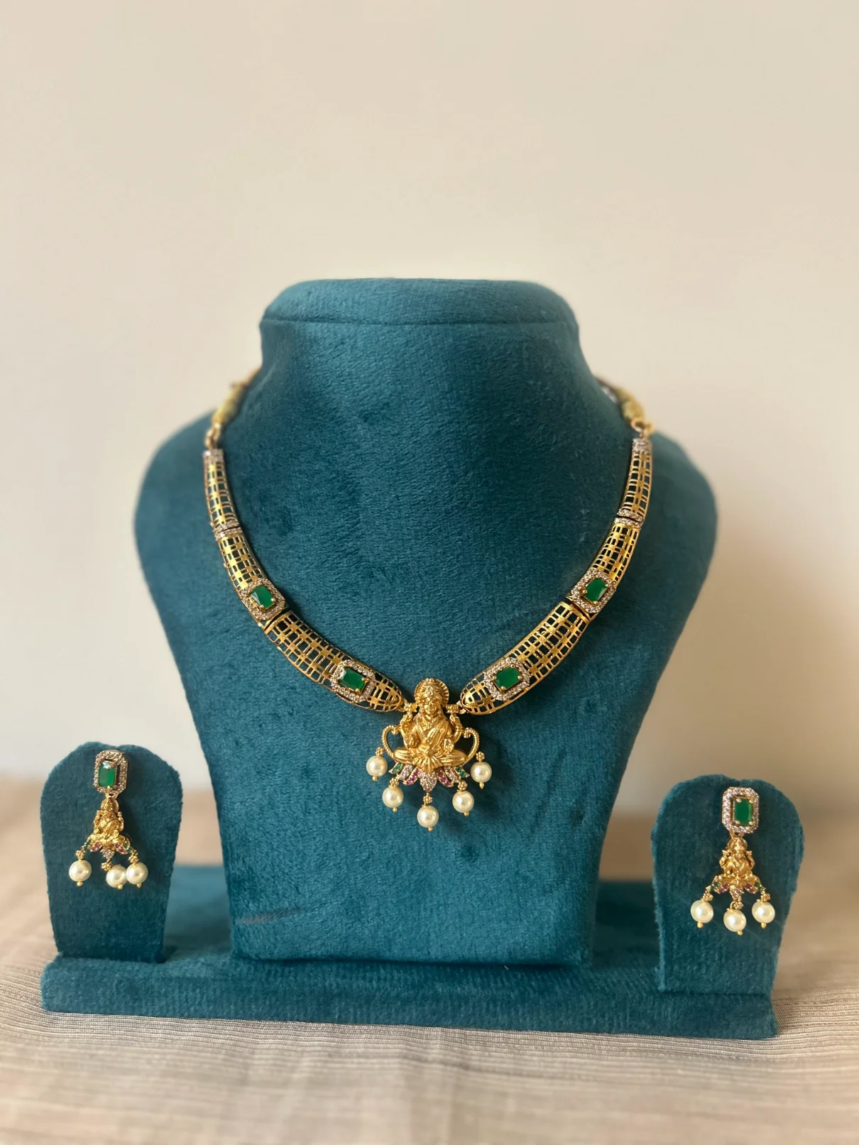 Gold Lakshmi devi kanti necklace set with emerald stones and pearl drops - S-cube Fashions